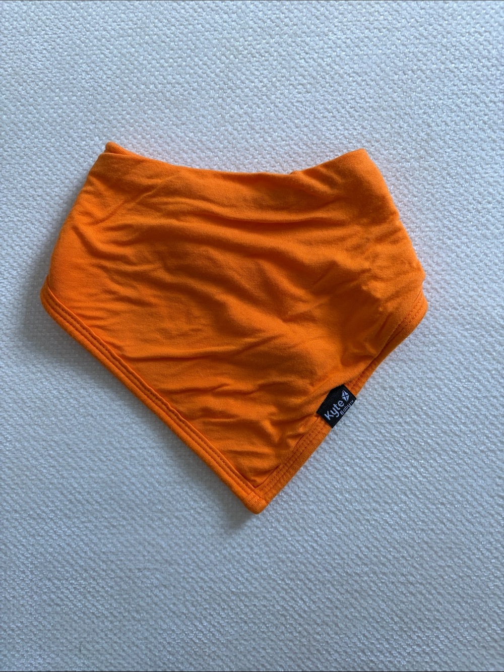 Kyte BABY Bib in Tangerine